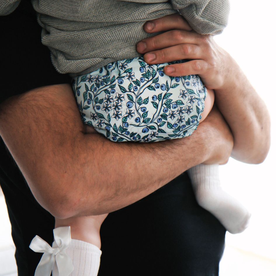 Baby wearing Eco Mini cloth diaper cover/ PUL skal - blueberry print