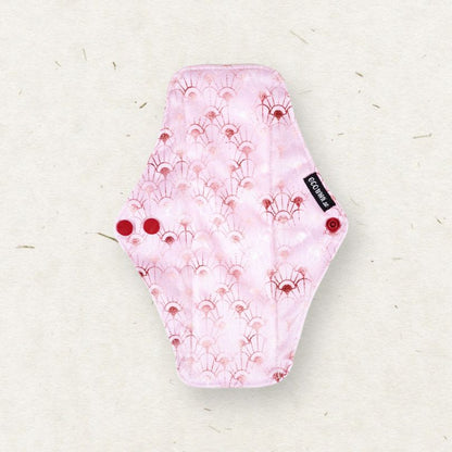 Eco Mini Reusable menstrual pad with pink floral pattern on a light background