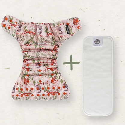 Eco Mini cloth diaper with a nature-themed pattern featuring animals and plants on a white background
