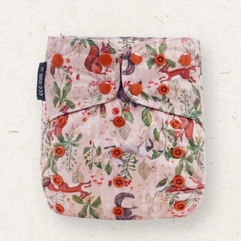 Eco Mini floral-patterned diaper cover with squirrels on a white background
