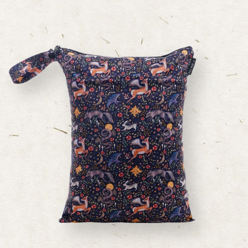 Reusable Eco Mini wet bag with a colorful animal pattern on a white background