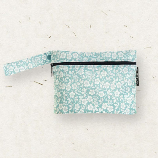 Eco Mini Mini wet bag - white floral print on blue background