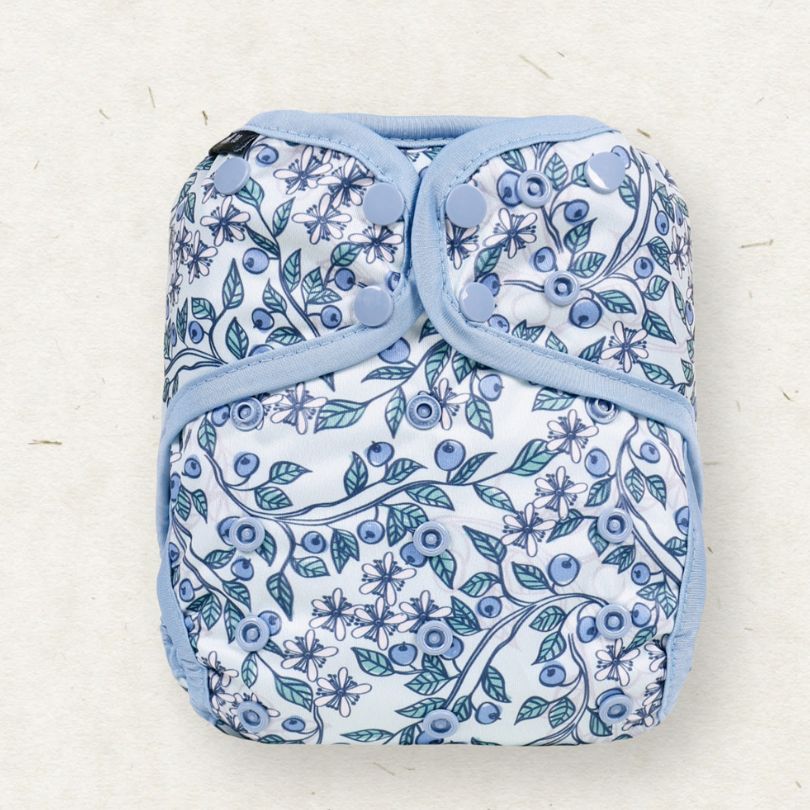 Eco mini Floral patterned cloth diaper on a light background