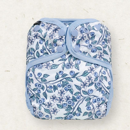 Eco mini Floral patterned cloth diaper on a light background