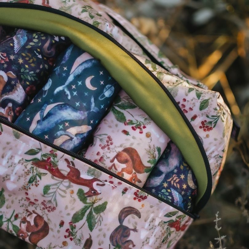 Eco Mini Cloth Diaper POD - squirrels print, packed with cloth diapers in a natural environment