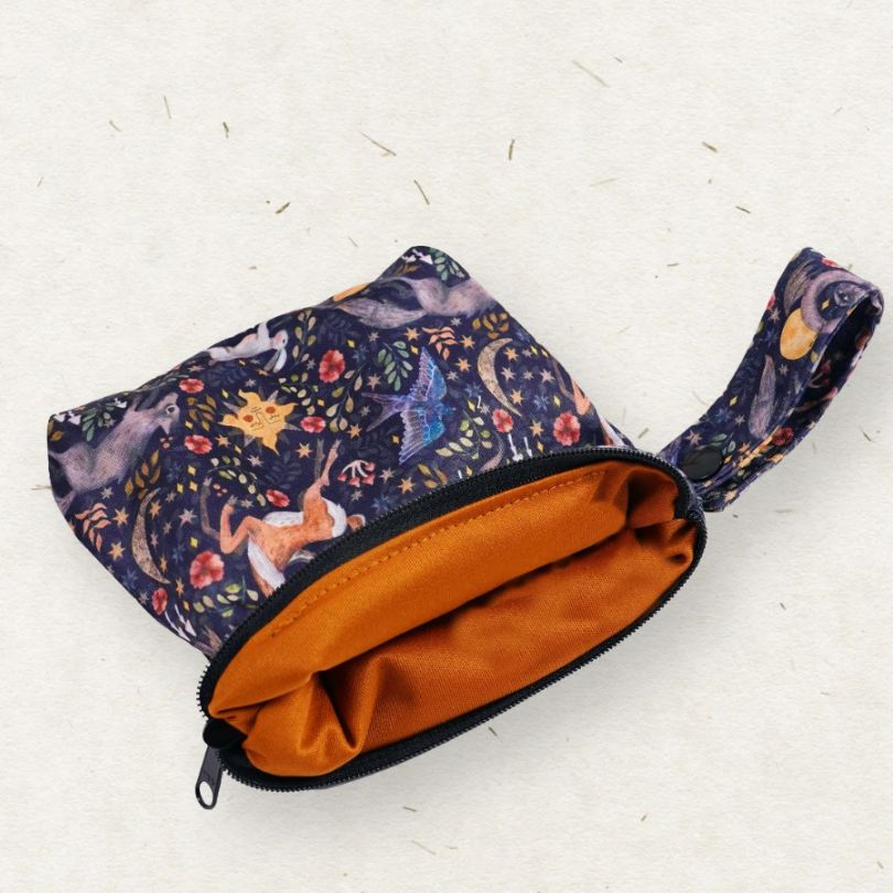 Small Eco Mini wet bag with  with celestial design on a white background