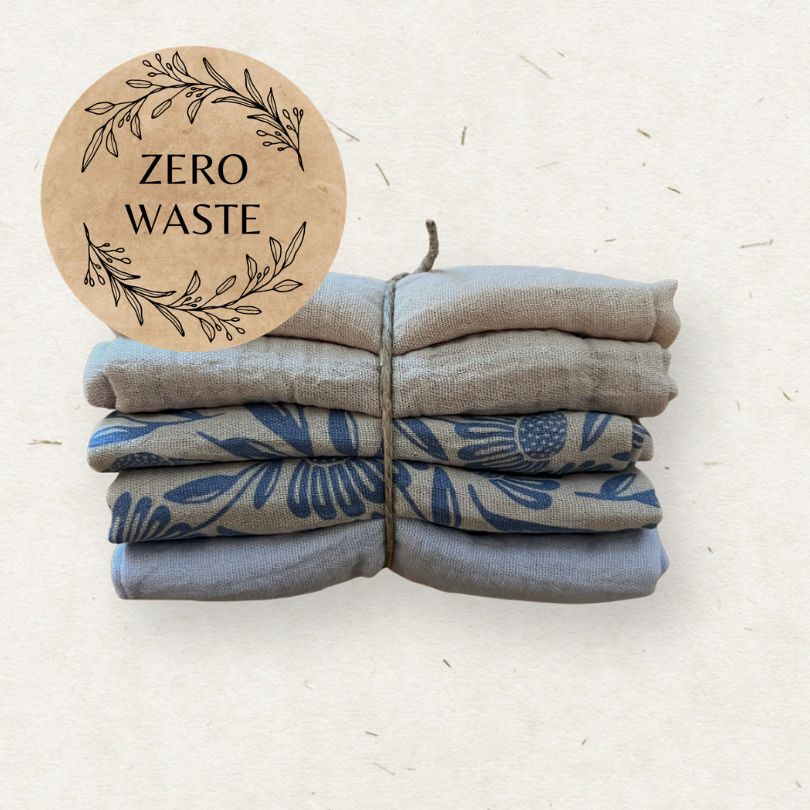Stack of Eco Mini cloth wipes with a 'Zero Waste' sticker on a light background