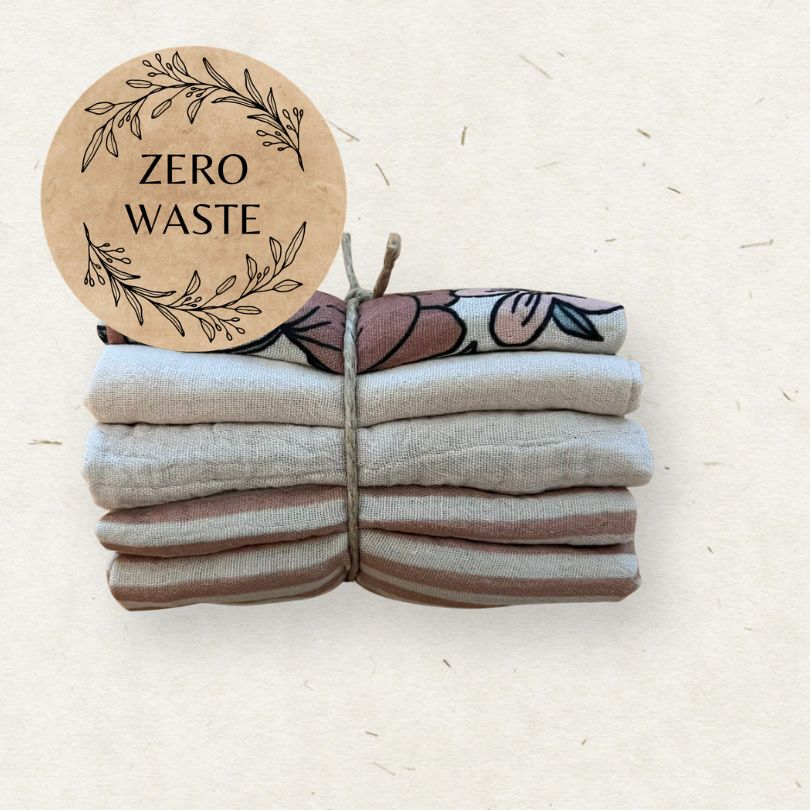 Stack of Eco Mini cloth wipes with a 'Zero Waste' sticker on a light background