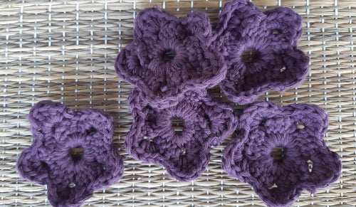 Set of 5 crocheted face scrubbies in shape of flowers